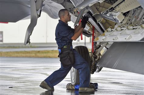 Air Force Senior Airman Frankie Ayala Cedeno Prepares To Arm An F 22