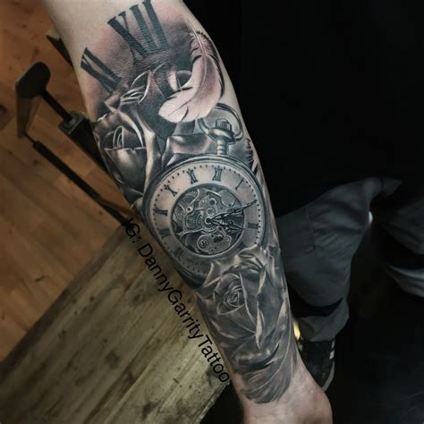 Again, this is another great idea for someone who wants to pay homage to their heritage or homeland in a tattoo. Men's sleeve tattoo with pocket watch rose and feathers ...