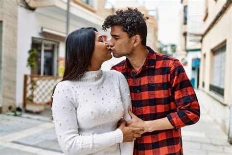 Young Latin Couple Kissing And Hugging At The City Stock Image Image Of Confident Female
