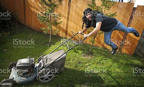 Crazy Rock And Roll Lawn Mower Man Stock Photo Download Image Now