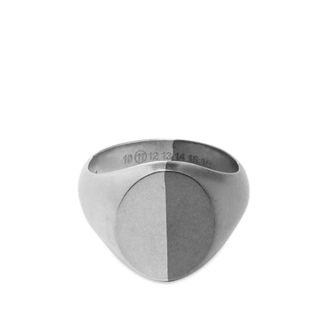 The maison margiela 11 collection silver ring features the house's numerical emblems engraved. Maison Margiela 11 Bi-Colour Signet Ring Silver & Black | END.