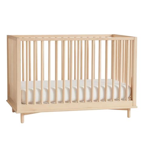 Traditional crib made of wood. Nash Convertible Baby Crib - Natural | West Elm