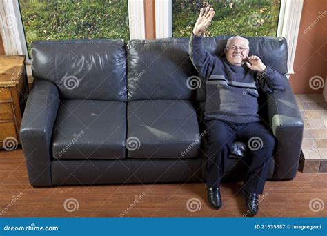 Happy Senior Man Waving Stock Image Image Of Livingroom 21535387