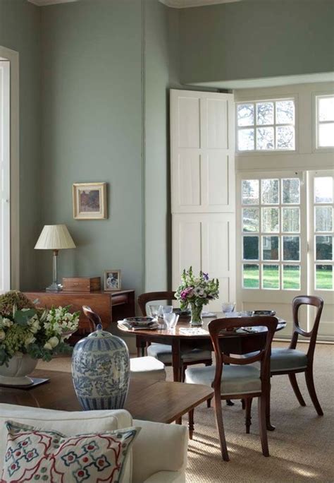Lavender, cream/beige, mossy greens, and silvery grays are great complementary colors. Could a navy (midnight) blue sofa go with this paint color?