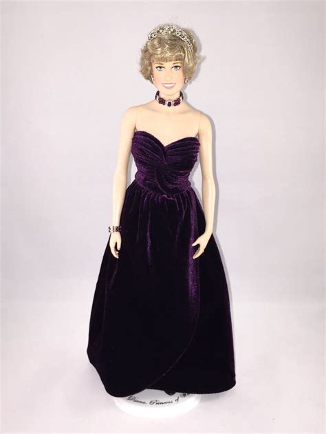 This Is A Franklin Mint Replica Of The Victor Edelstein Purple Velvet