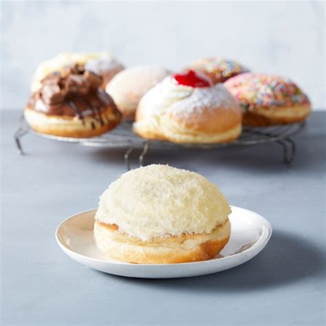 Light Fluffy Donut Topped With Our Boston Crème And Dipped In Coconut
