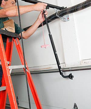 Our garages get a lot of wear. There Are Many Risks to Do-It-Yourself Garage Door Spring and Cable Repair | Markham Garage ...