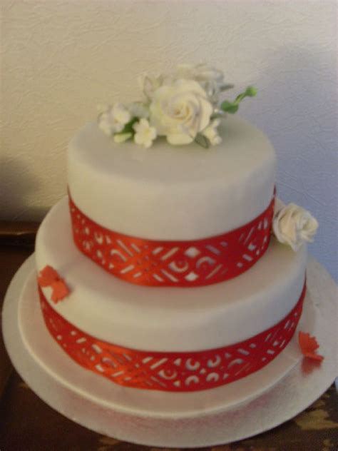 Red Ribbon Cake Photo De Wedding Cakes Julias Wedding Cakes