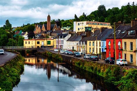 Beautiful Landscape In Donegal Ireland With River And Colorful Houses