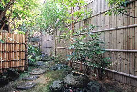 Japanese garden with a stone bench. Bamboo Twine