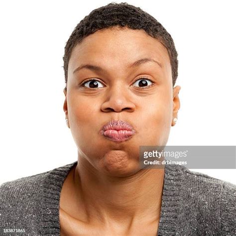 Puffed Out Cheeks Photos And Premium High Res Pictures Getty Images