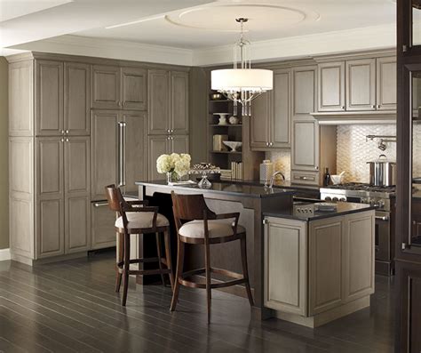When planning our kitchen, our designer and our builder said that the cabinets in your kitchen are the furniture that people see in that room and that you should buy quality. Traditional Kitchen with Cherry Cabinets - Omega