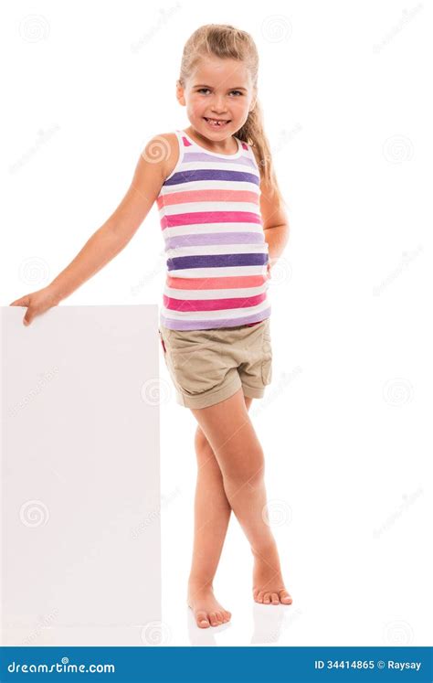 Little Girl Is Standing On White Background And Holding White Ca Stock