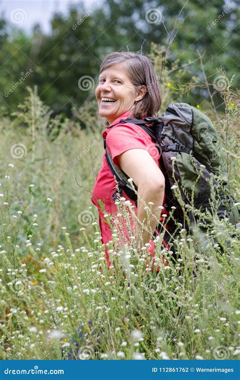 Woman In Her 50s Hiking In Nature Stock Photo Image Of Pensioner