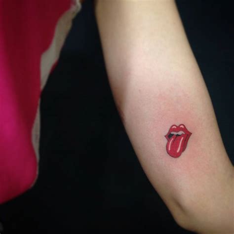 Forearm Tattoo Of The Logo Of The Rolling Stones By
