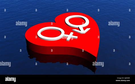 Heterosexual Couple In Red Heart Floating In The Ocean Stock Photo Alamy