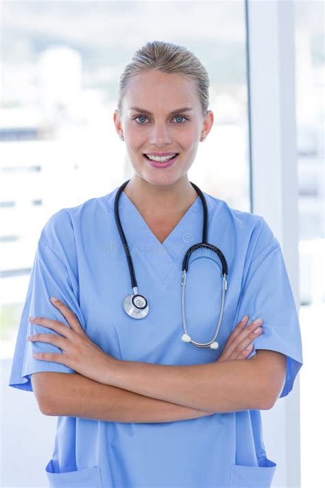 Happy Doctor Looking At Camera With Arms Crossed Stock Photo Image Of