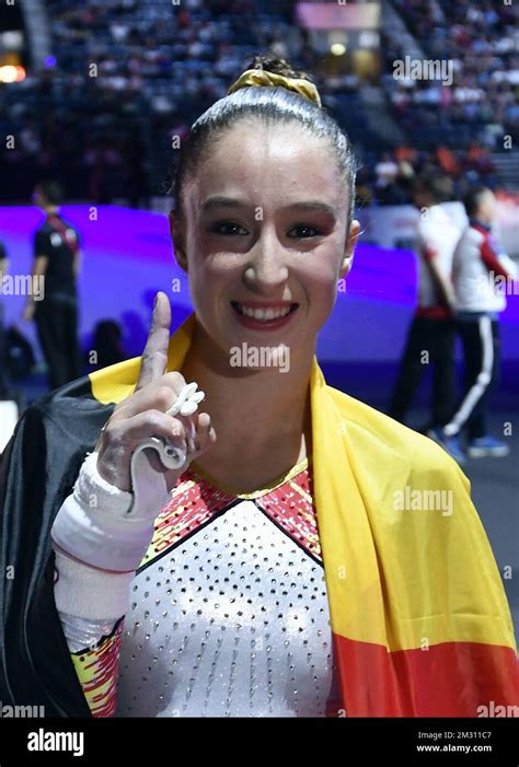Belgian Gymnast Nina Derwael Celebrates After Winning The Finals Of The Uneven Bars Event At The