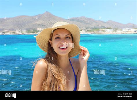 Young Cheerful Bikini Woman With Hat Looking At Camera Relaxing Sunbathing Holidays In