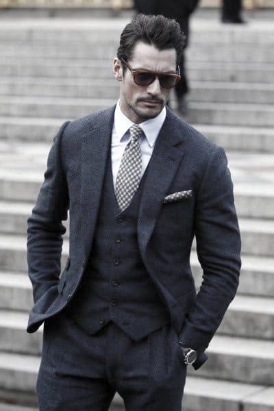 All of the pictures from the infographic are of guys in suits that are just casually looking around or waiting for a great example of style/fashion being personal preference. 90 Navy Blue Suit Styles For Men - Dapper Male Fashion Ideas
