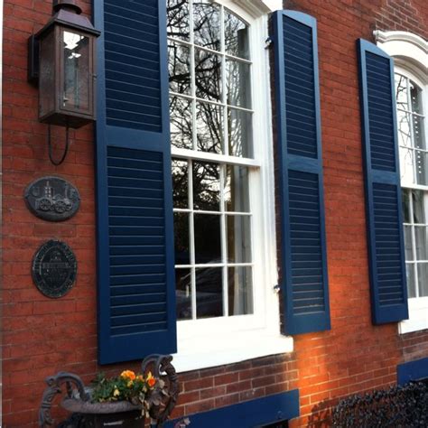 Royal Blue Shutters On Red Brick Exterior This Could Be A Fun Color