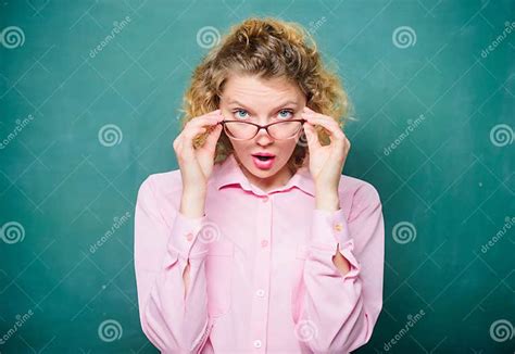 adorable nerd woman school teacher shy and pretty lady wear eyeglasses chalkboard background