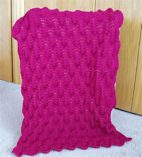 13 free shawl knitting patterns you'll love to stitch. Lacy Cranberry Lap Robe ⋆ Knitting Bee