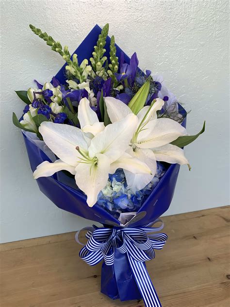 Blue And White Flowers Wrapped Bouquet In San Jose Ca La Floriya