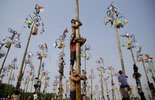 Climbing The Greasy Pole Jakarta Style Bizarre Celebration Rituals