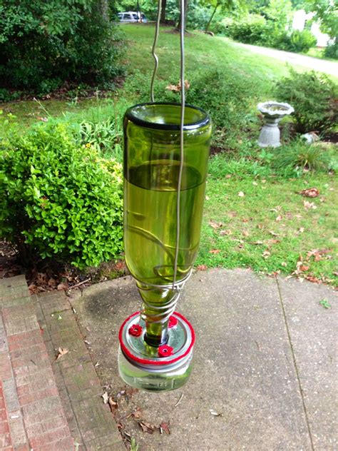You can use these simple designs to attract bluebirds, swallows, chickadees, nuthatches, warblers, woodpeckers, wrens, and other birds to your garden. Finished DIY hummingbird feeder~ Wine bottle Small glass ...