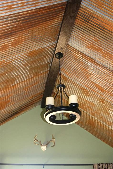 Faux tin ceiling tiles are used in the design of ceilings. Barn tin ceiling. Acid stain new galvanized tin to work ...