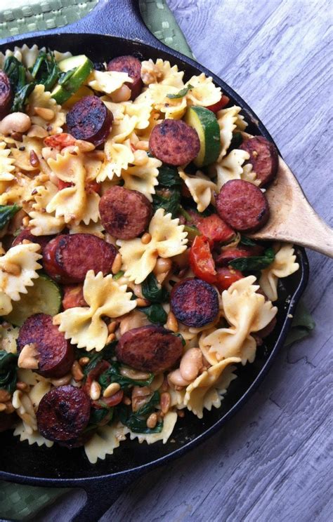 This easy smoked sausage with pasta recipe is topped off with the addition of vegetables for a filling family dinner. Smoked Sausage, White Bean and Spinach Pasta with Toasted ...