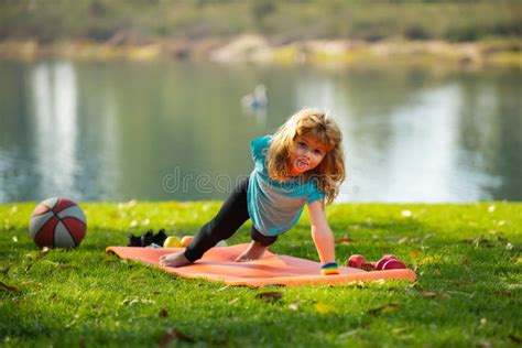 Child Doing Push Ups Exercise Outdoors Healthy Kids Lifestyle