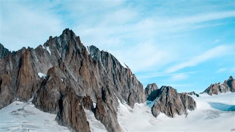 Download Winter Glacier Rocky Cliffs 1366x768 Wallpaper Tablet