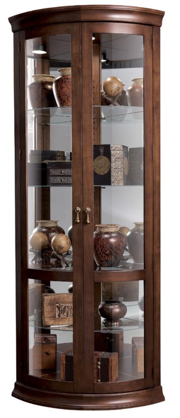 This traditional corner glass display cabinet is great will tuck neatly into your home. Chancellor+Corner+Curio+Cabinet | Corner curio