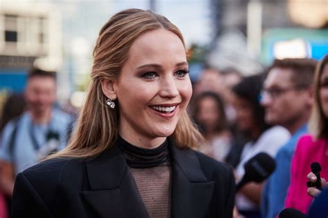 jennifer lawrence paired her super short blazer dress with a seriously sheer top