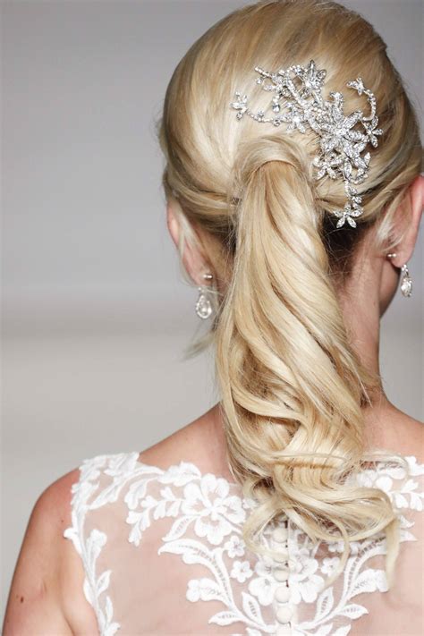 Pull all your hair back and up, tie it together with a hair band and walk out of the door, ready to take on a new day! Bridal Ponytail Hairstyles For The Experimental Bride