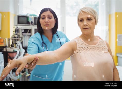 Female Doctor Examining A Patient Stock Photo Alamy