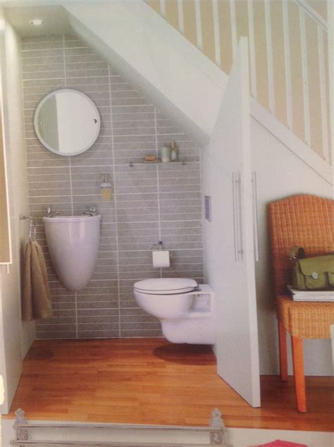 Downstairs cloakroom under the stairs. Great use of space. | Bathroom