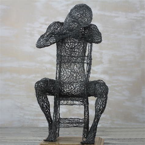 Steel Wire Sculpture Of A Man Sitting From Ghana Tomorrow Never Comes