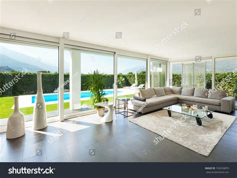 Elegant silverhurst house by saota is a prominent, modern country villa set in constantia's once inside, in the whole of the house, the natural materials were used to add warmth and texture. Modern Villa Interior Beautiful Living Room Stock Photo ...