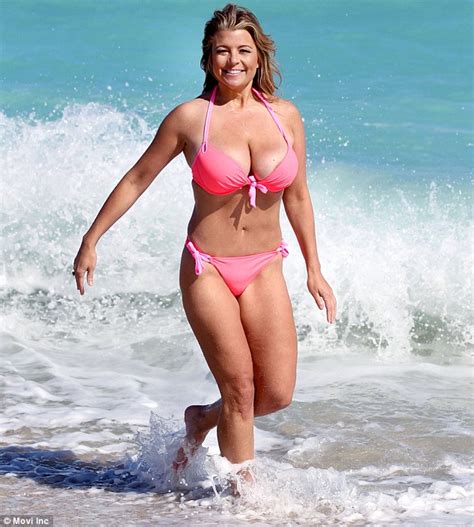 Real Housewives Star Dana Wilkey Squeezes Her Ample Curves In A Hot