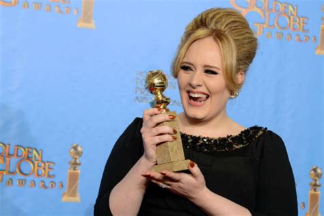 Adele Baby Name Rumor Has It Appearing On Her Necklace