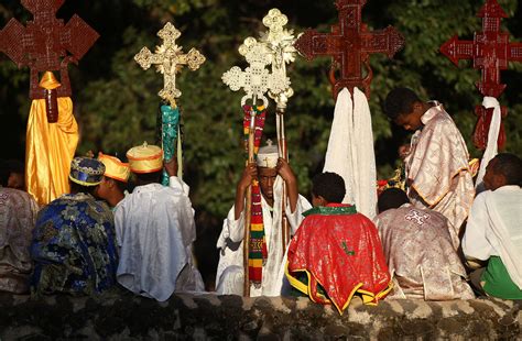 Ethiopian Orthodox Faithful Hold Crosses During Ethiopias Timket