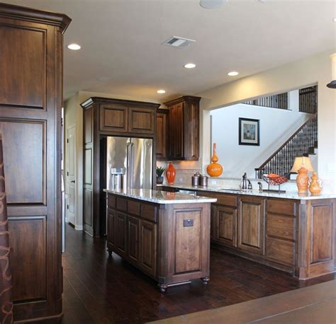 Expect knots, some small and tight, others big and open, to add character to each cabinet door and provide a cozy and natural touch. Burrows Cabinets kitchen in stained knotty alder and ...