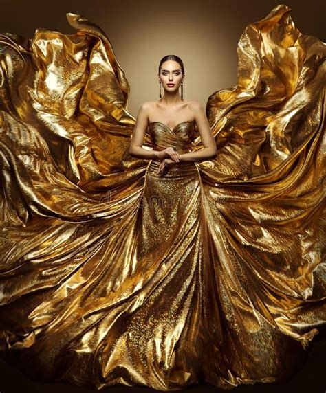 Photo About Gold Woman Flying Dress Fashion Model In Waving Golden