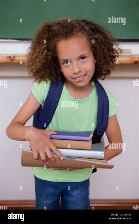 Child Carrying Books Class Hi Res Stock Photography And Images Alamy