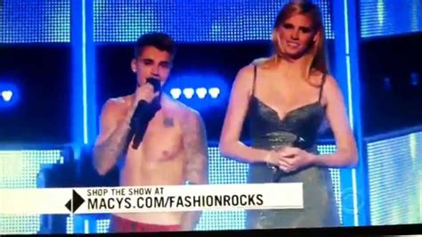 Justin Bieber Stripping At Fashion Rocks Beside Rita Ora Youtube