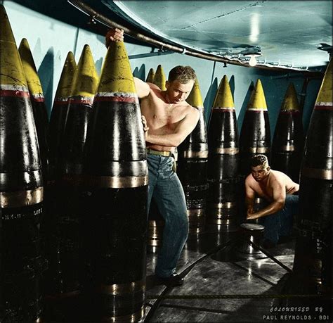 Ordnance Men Moving A Shell From Its Storage Stall To Ammunition Hoist On Board The Iowa
