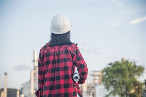 Woman Construction Engineer Wear Safety White Hard Hat At Construction